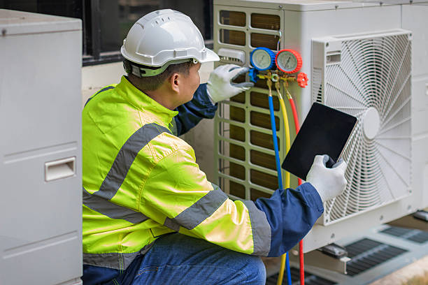Professional Air Duct Cleaning technician working in Warren, RI